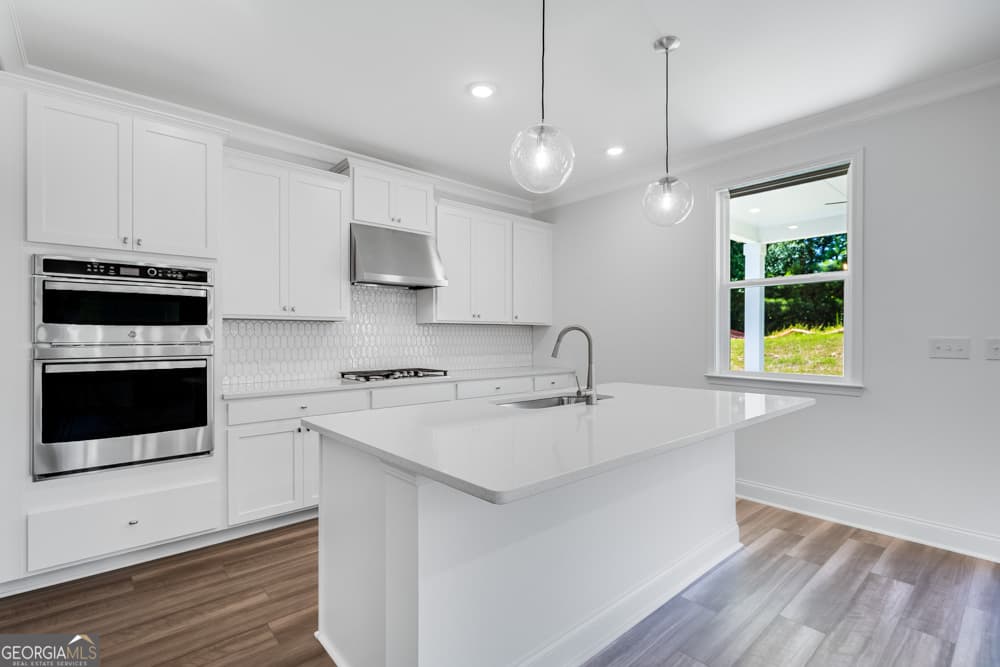 4 bedroom, 3.5 bathroom, 2,696 sq ft single family residence for sale at 2230 Dreycott Lane, Lawrenceville, GA 30043 — photo 2