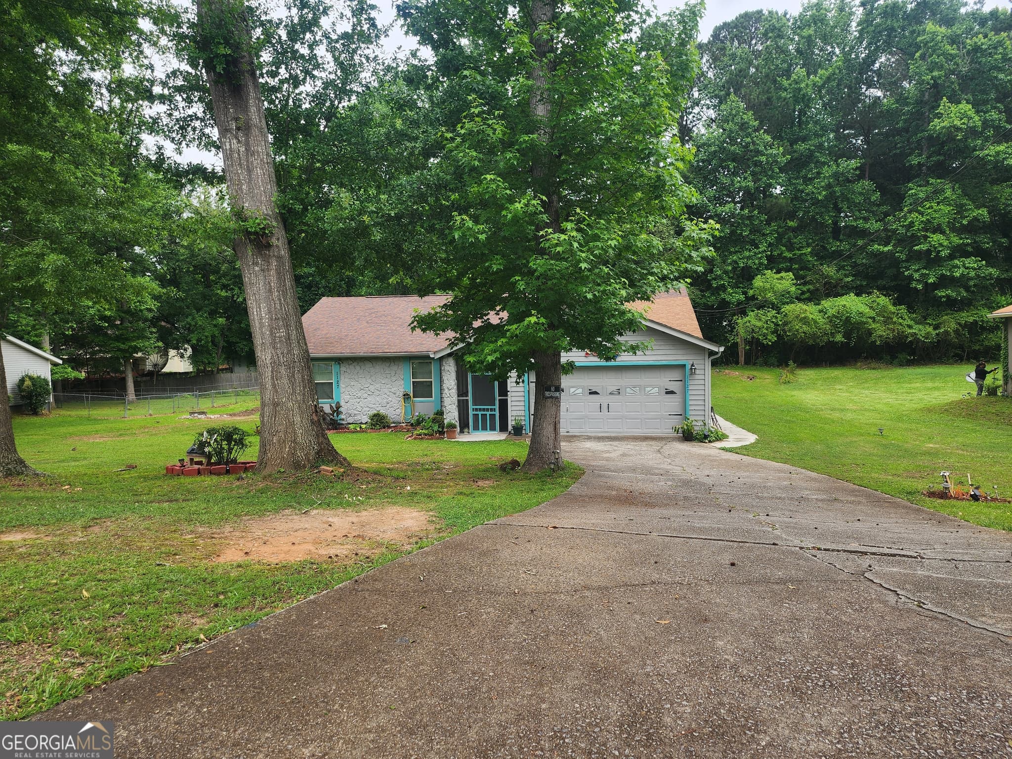 3 bedroom, 2 bathroom, 1,738 sq ft single family residence for sale at 1127 Pond Ridge Drive, Riverdale, GA 30296 — photo 1 of 4