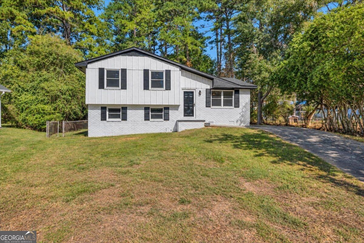 3 bedroom, 2 bathroom, 1,534 sq ft single family residence for sale at 7977 Flanders Court, Jonesboro, GA 30238 — photo 1 of 29