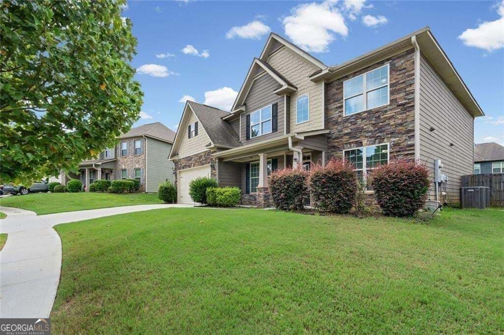 5 bedroom, 3 bathroom, 3,558 sq ft single family residence for sale at 1125 Acorn Oak Drive, Lawrenceville, GA 30045 — photo 2
