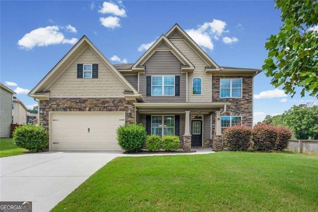 5 bedroom, 3 bathroom, 3,558 sq ft single family residence for sale at 1125 Acorn Oak Drive, Lawrenceville, GA 30045 — photo 4