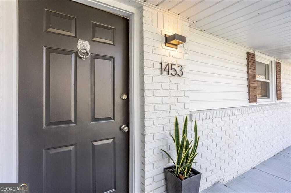 5 bedroom, 3 bathroom, 2,799 sq ft single family residence for sale at 1453 Oconee Pass, Brookhaven, GA 30319 — photo 3