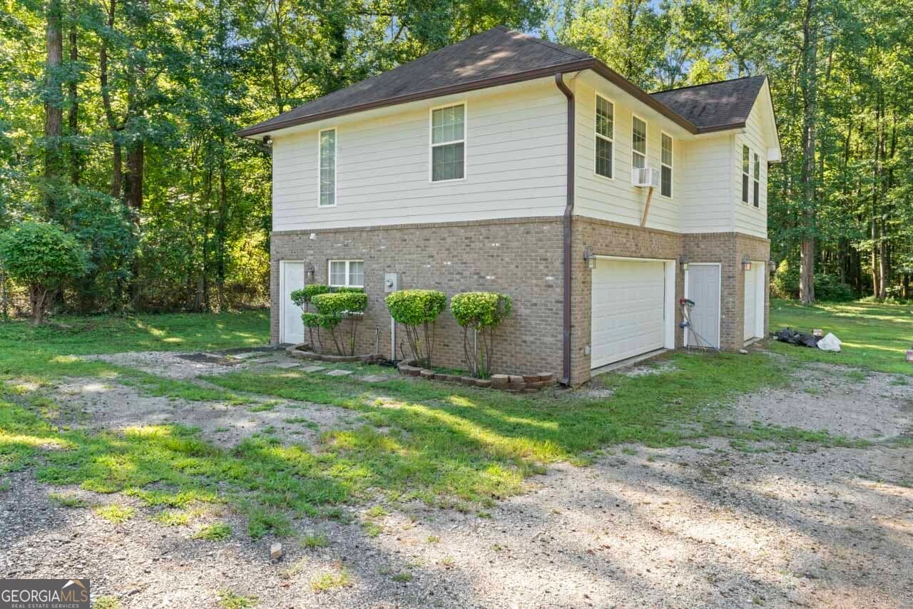 4 bedroom, 2.5 bathroom, 3,978 sq ft single family residence for sale at 515 Valley Hill Road, Stockbridge, GA 30281 — photo 3