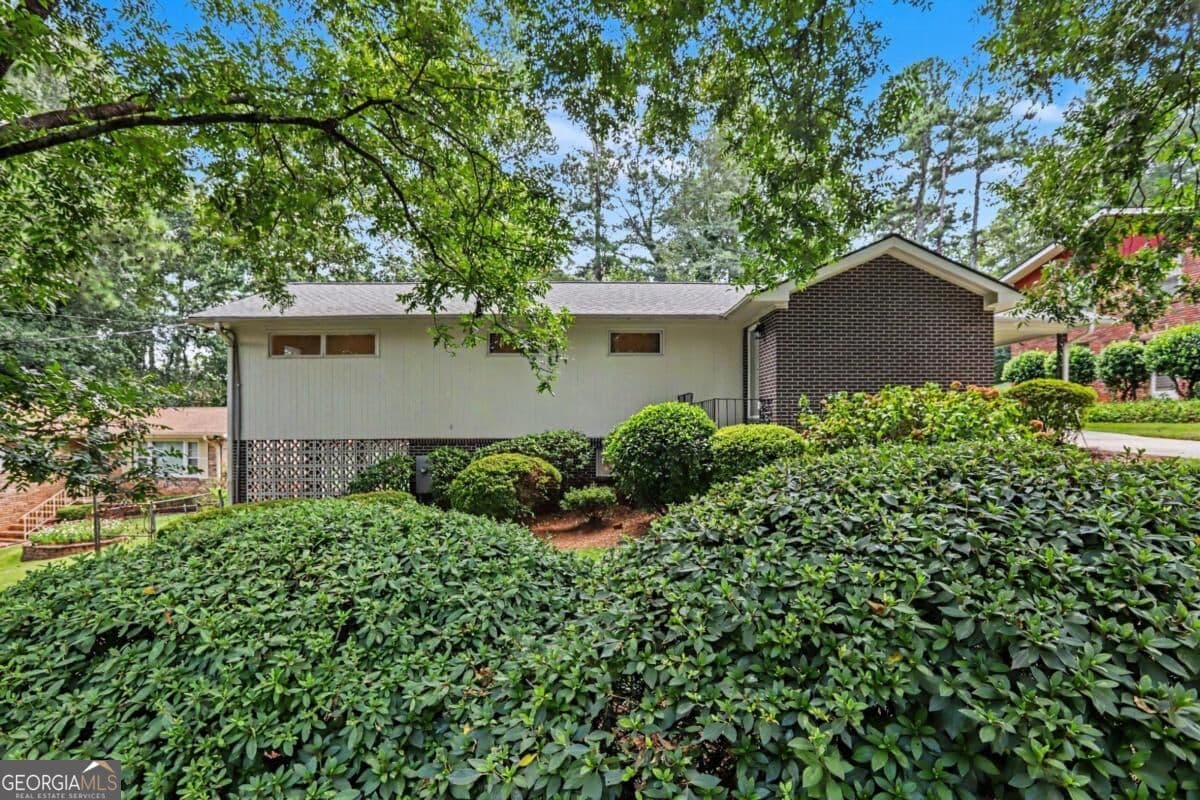 4 bedroom, 2 bathroom single family residence for sale at 2213 Doris Drive, Decatur, GA 30034 — photo 3
