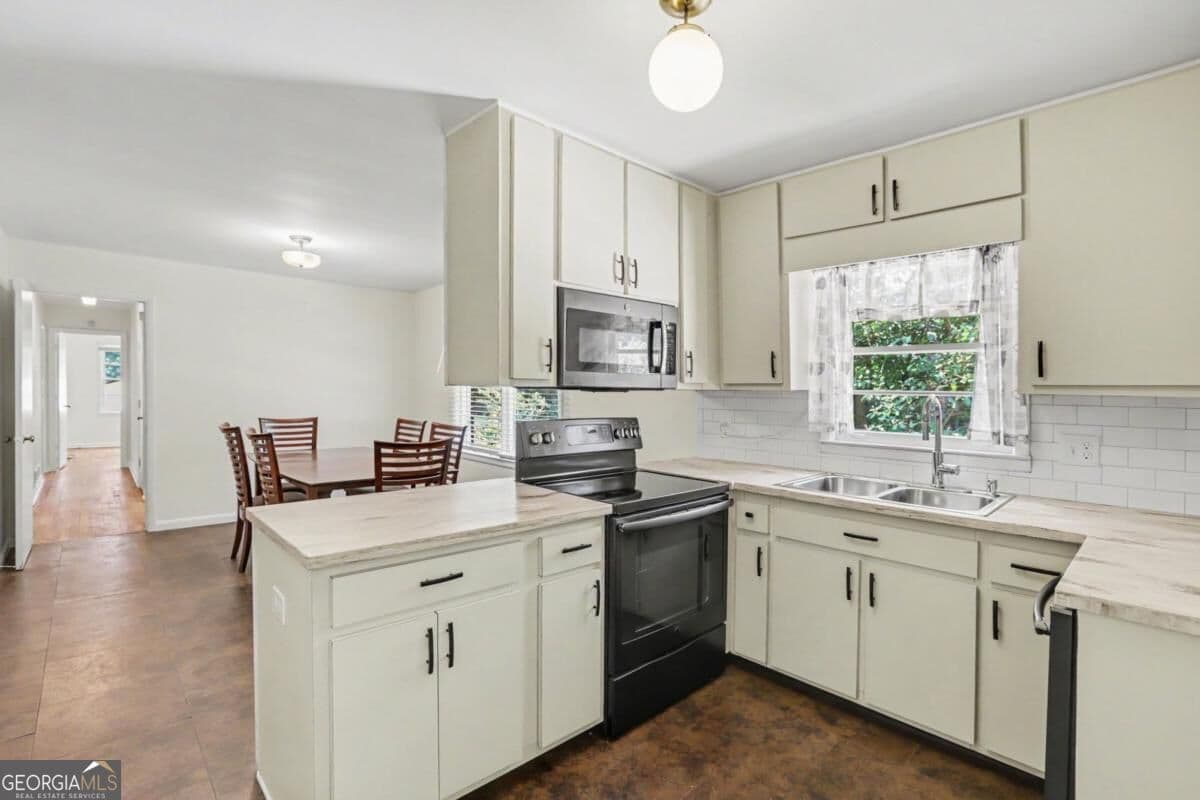 4 bedroom, 2 bathroom single family residence for sale at 2213 Doris Drive, Decatur, GA 30034 — photo 9