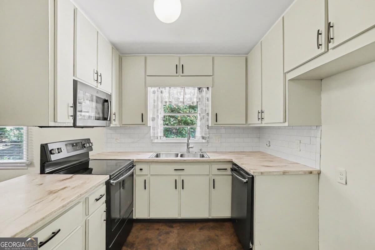 4 bedroom, 2 bathroom single family residence for sale at 2213 Doris Drive, Decatur, GA 30034 — photo 10