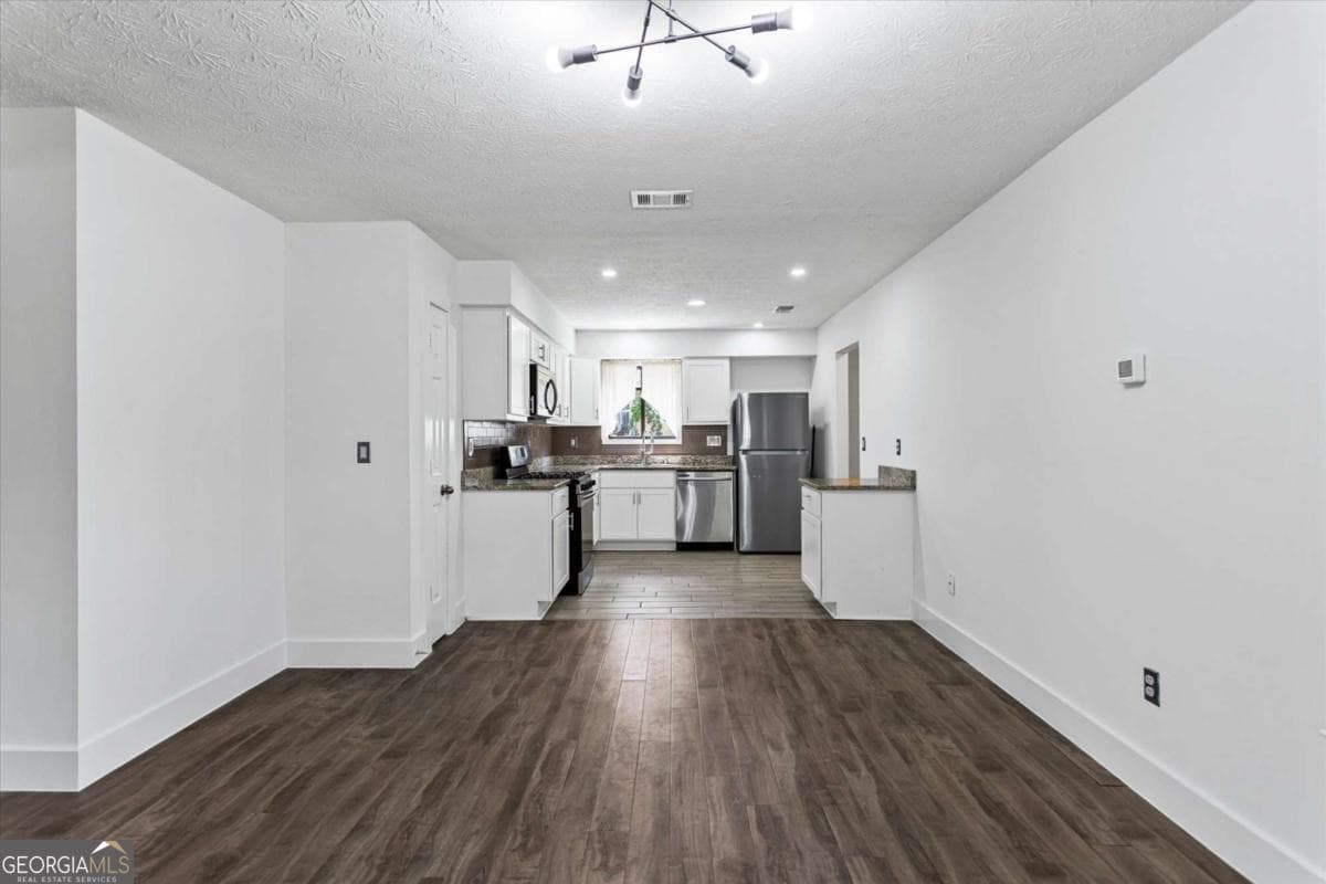 3 bedroom, 2 bathroom single family residence for rent at 140 Grayland Creek Drive, Lawrenceville, GA 30046 for $2,100 a month — photo 6