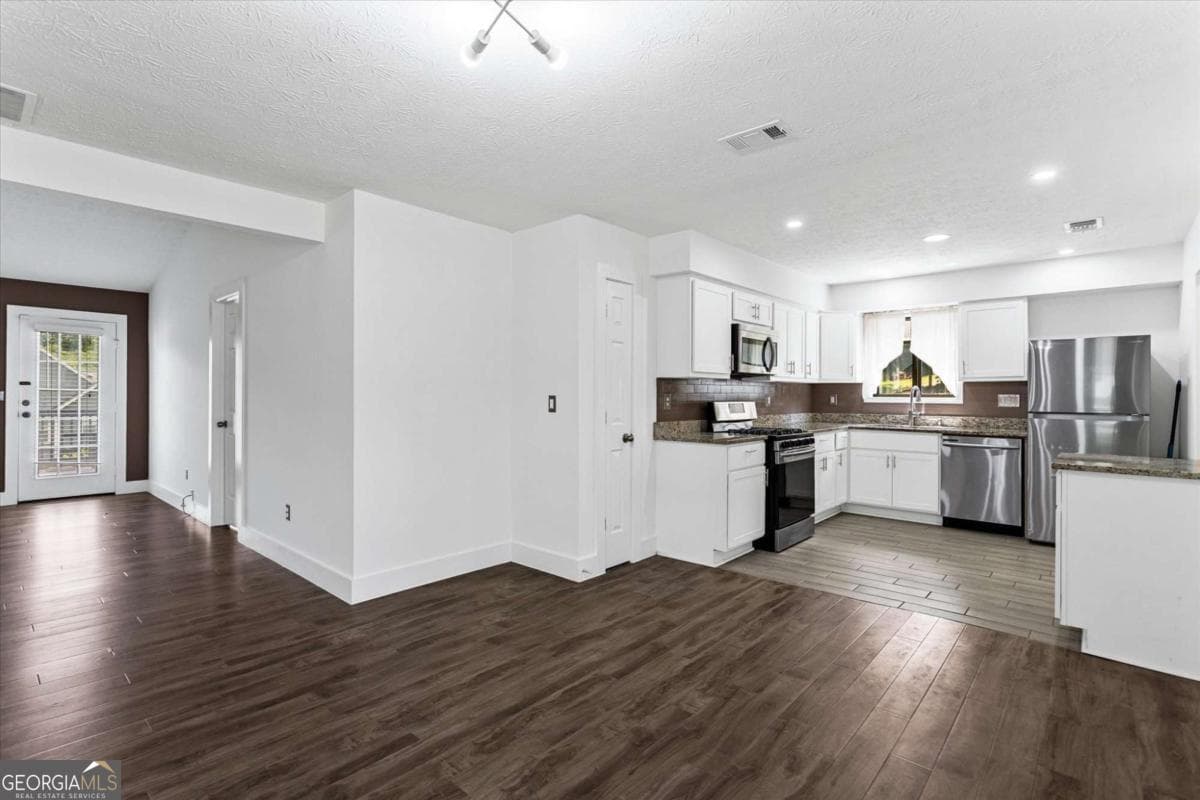 3 bedroom, 2 bathroom single family residence for rent at 140 Grayland Creek Drive, Lawrenceville, GA 30046 for $2,100 a month — photo 5
