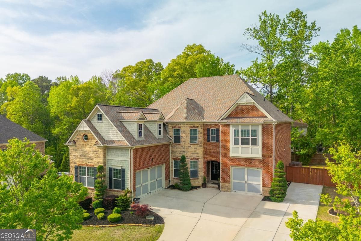 6 bedroom, 5 bathroom, 6,127 sq ft single family residence sold at 4589 Misty Meadows Drive, Marietta, GA 30066
