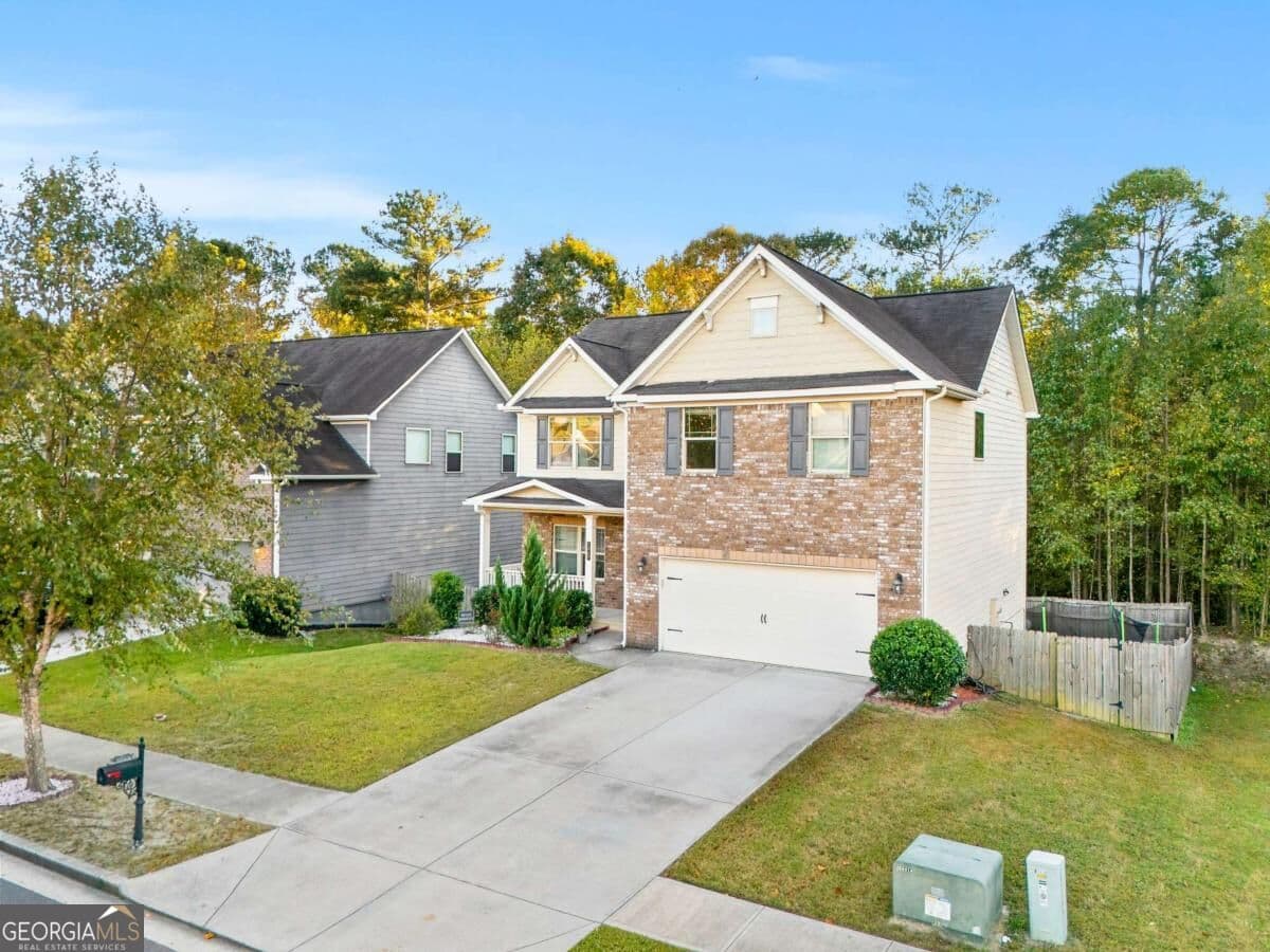 5 bedroom, 3.5 bathroom, 3,259 sq ft single family residence for sale at 1347 Balvaird Drive, Lawrenceville, GA 30045 — photo 2