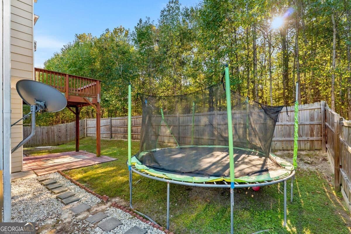 5 bedroom, 3.5 bathroom, 3,259 sq ft single family residence for sale at 1347 Balvaird Drive, Lawrenceville, GA 30045 — photo 5