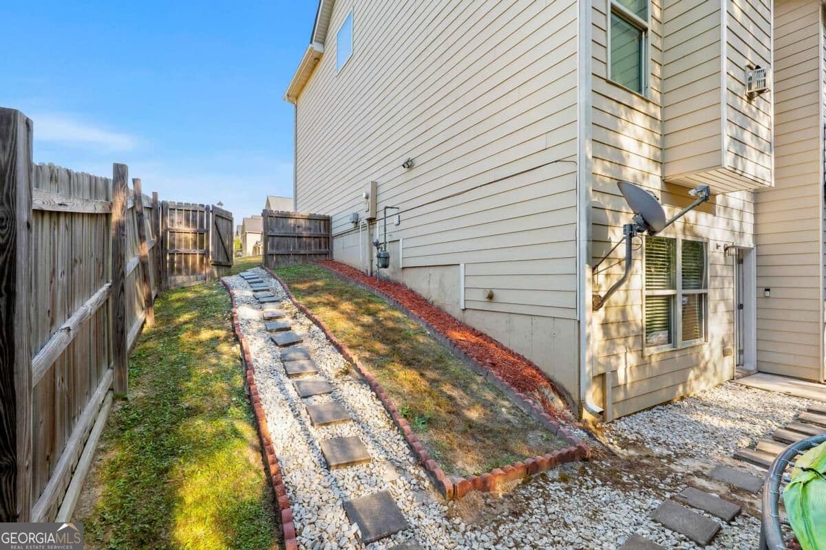 5 bedroom, 3.5 bathroom, 3,259 sq ft single family residence for sale at 1347 Balvaird Drive, Lawrenceville, GA 30045 — photo 4