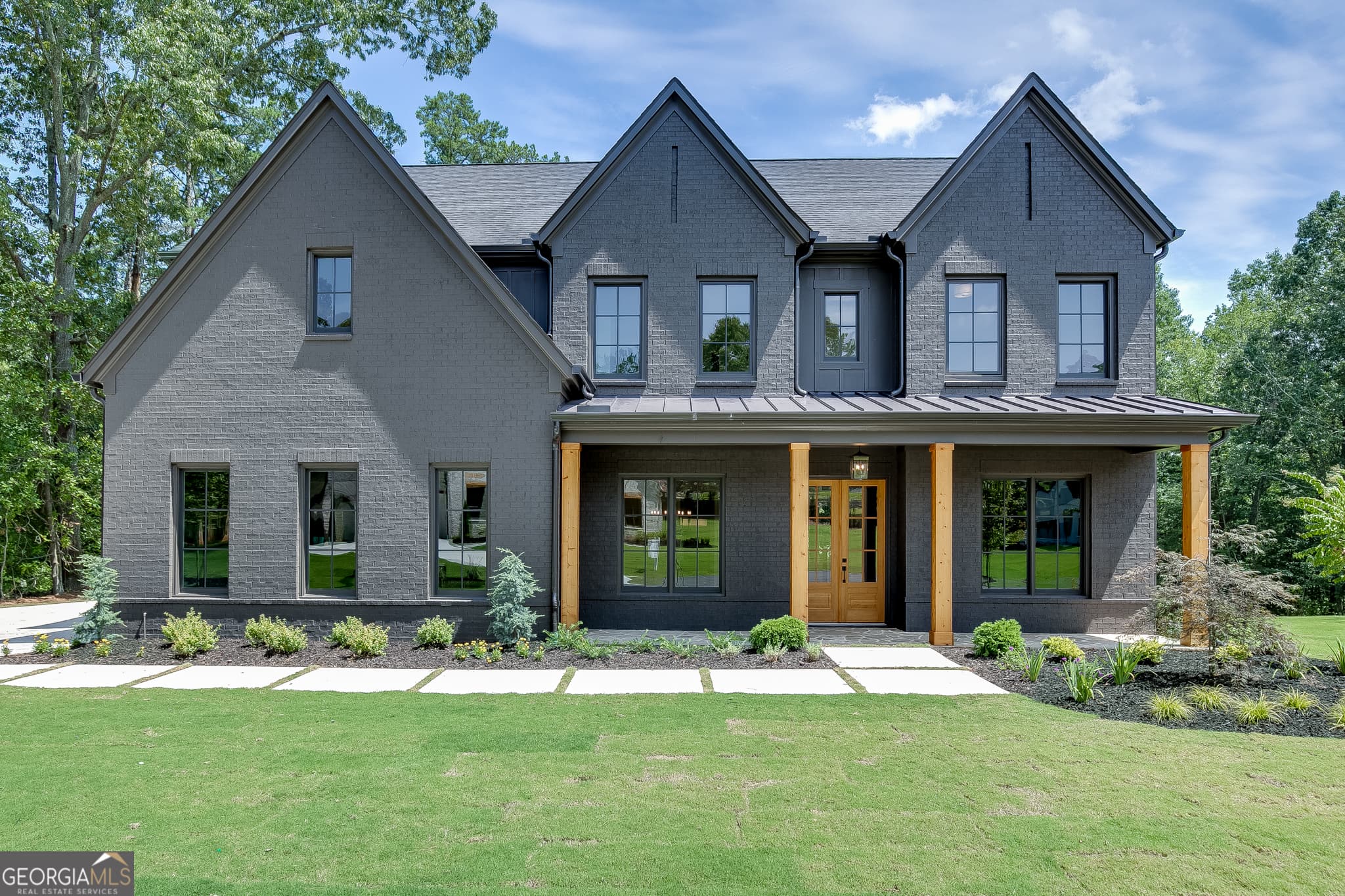 5 bedroom, 4.5 bathroom, 4,159 sq ft single family residence for sale at 2973 N Bogan Road 3, Buford, GA 30519 — photo 2