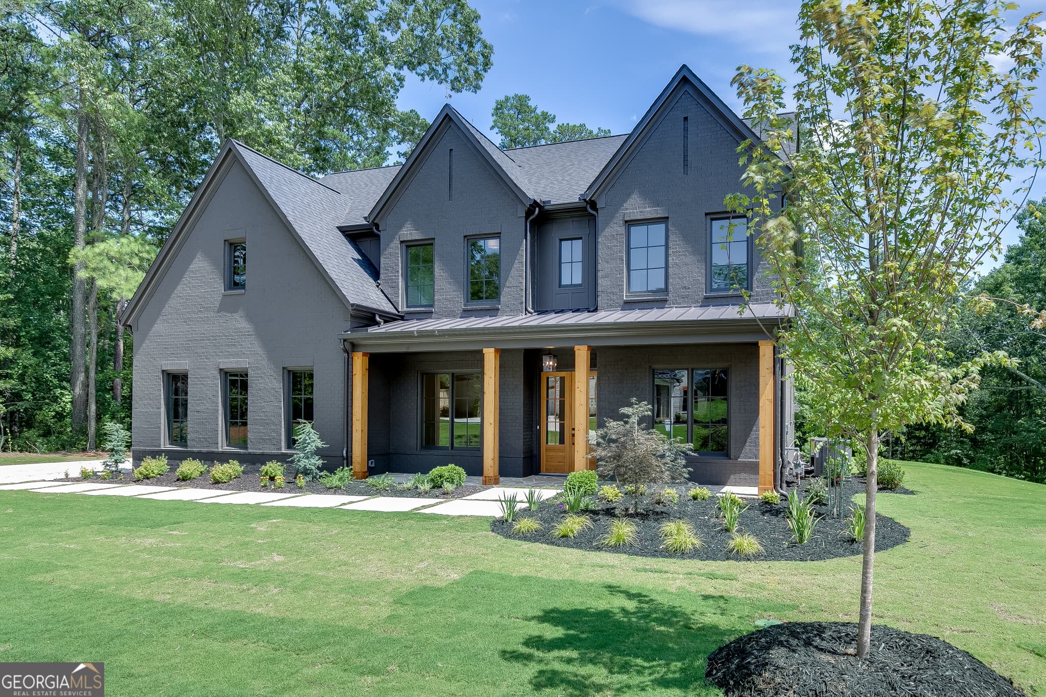 5 bedroom, 4.5 bathroom, 4,159 sq ft single family residence for sale at 2973 N Bogan Road 3, Buford, GA 30519 — photo 3