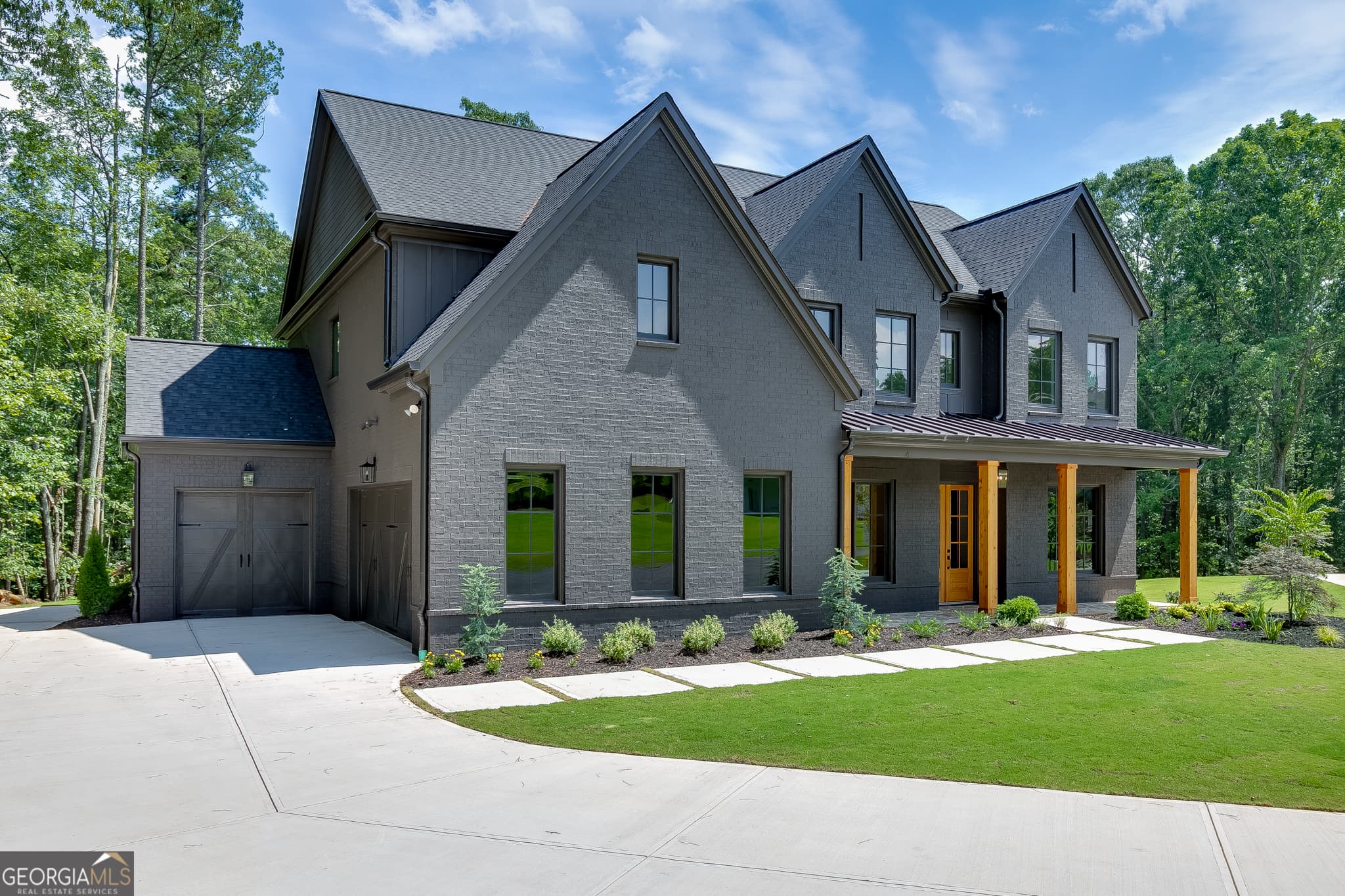 5 bedroom, 4.5 bathroom, 4,159 sq ft single family residence for sale at 2973 N Bogan Road 3, Buford, GA 30519 — photo 4