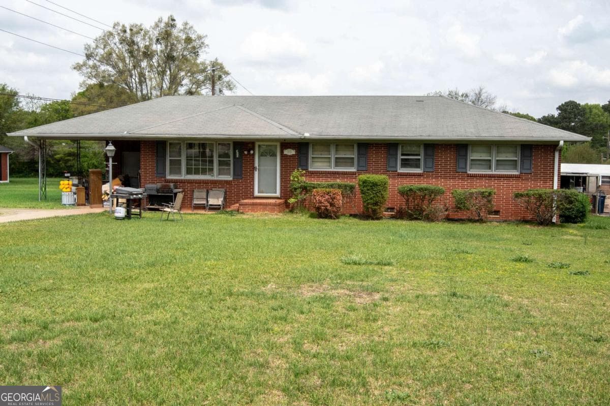 3 bedroom, 2 bathroom, 1,250 sq ft single family residence for sale at 313 Mobley Street, Griffin, GA 30223 — photo 2