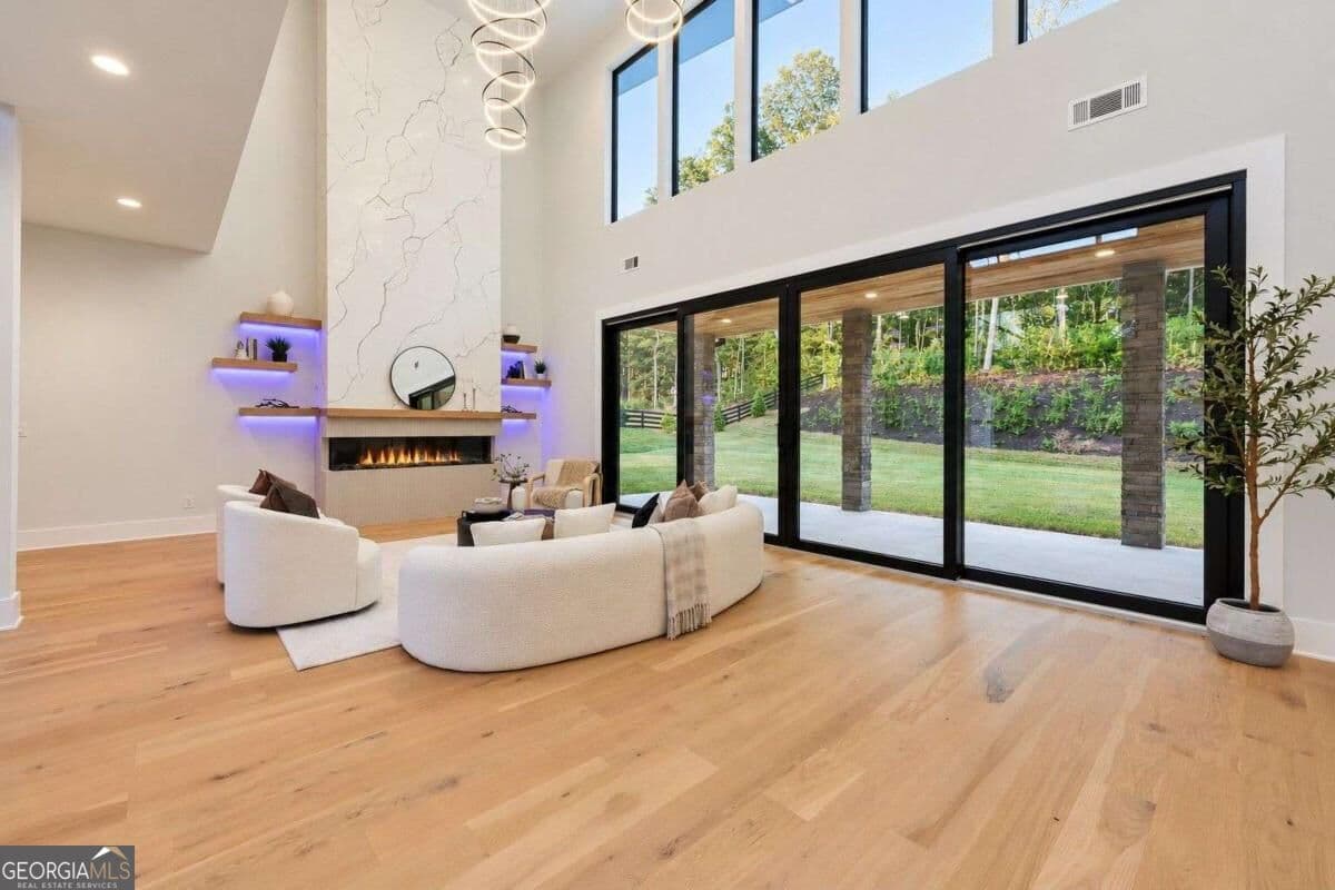 5 bedroom, 6.5 bathroom, 4,962 sq ft single family residence for sale at 1678 Thomas Drive, Hoschton, GA 30548 — photo 4