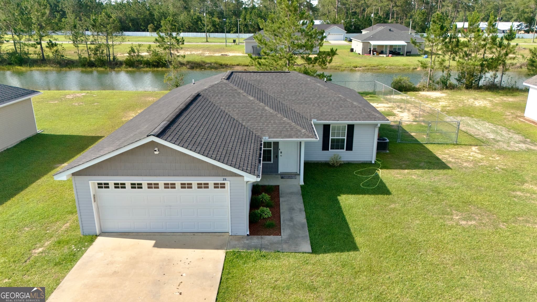 3 bedroom, 2 bathroom single family residence for sale at 211 Twinn Lakes Drive, Baxley, GA 31513 — photo 1 of 43