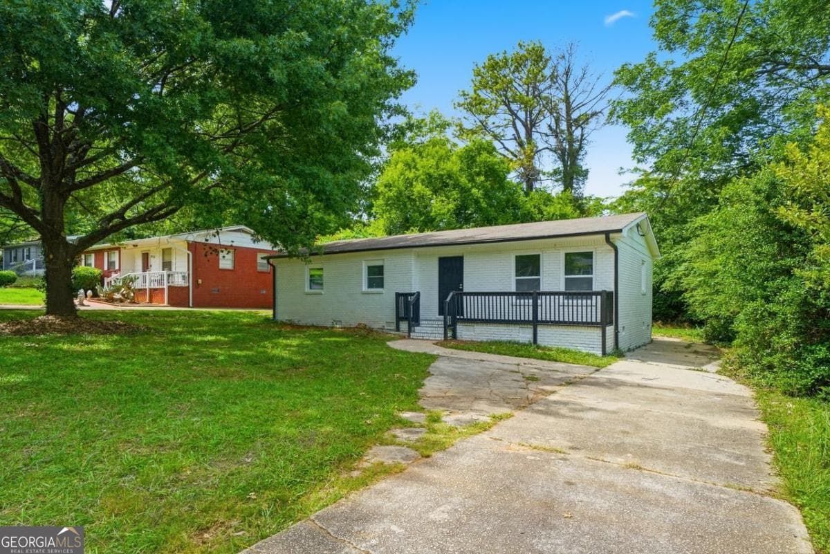 4 bedroom, 2 bathroom, 1,254 sq ft single family residence for sale at 1929 Bandera Drive, Decatur, GA 30032 — photo 2