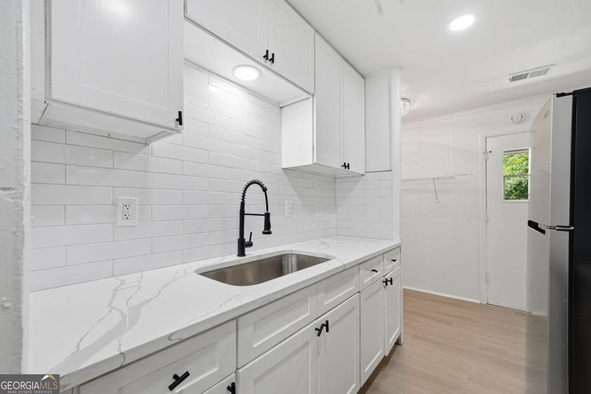 4 bedroom, 2 bathroom, 1,254 sq ft single family residence for sale at 1929 Bandera Drive, Decatur, GA 30032 — photo 7