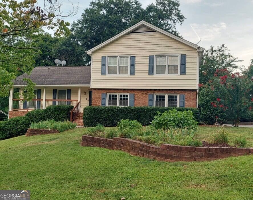 5 bedroom, 2.5 bathroom single family residence for sale at 721 Dorsey Circle, Lilburn, GA 30047