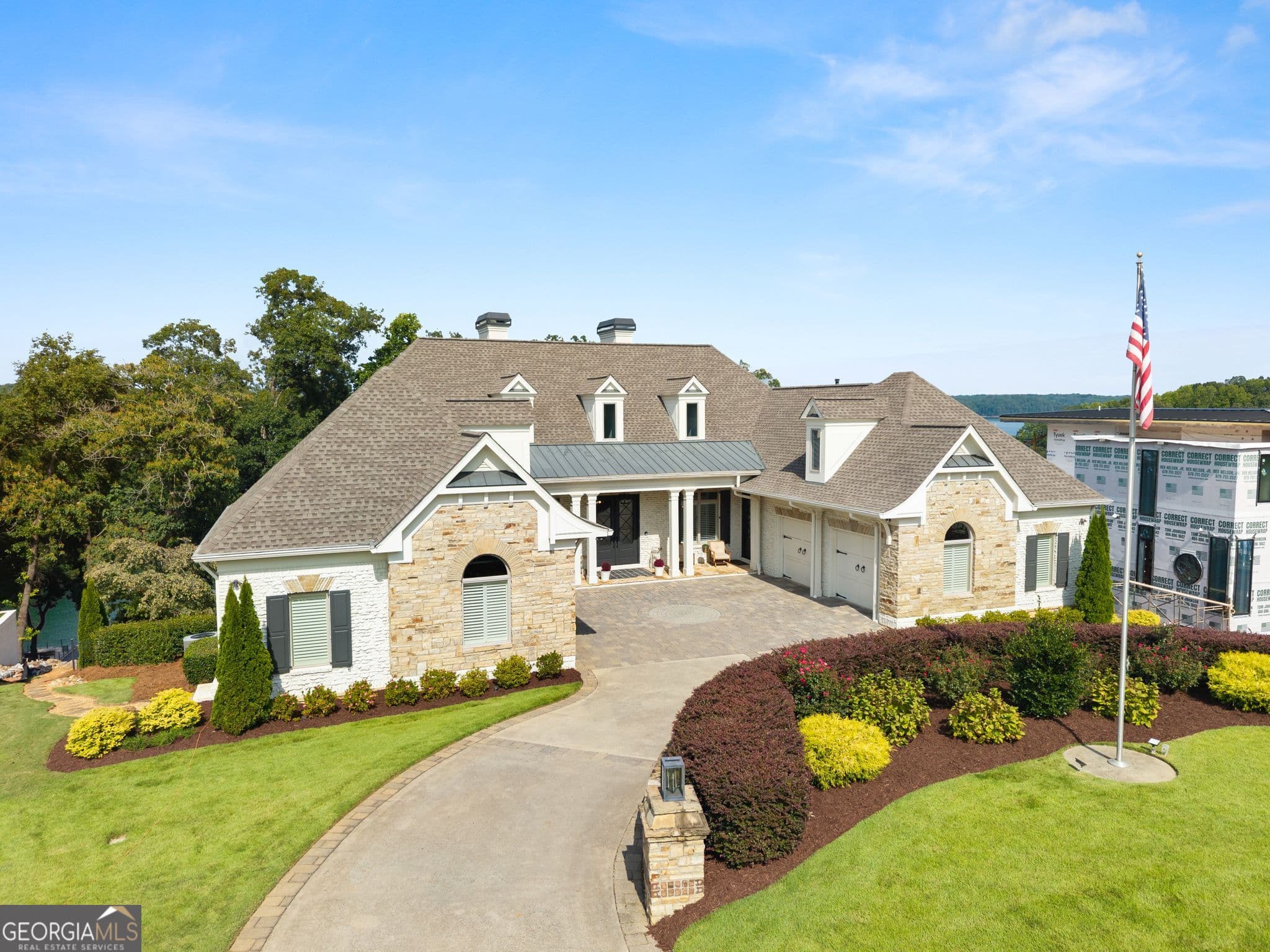 6 bedroom, 6 bathroom, 7,725 sq ft single family residence for sale at 9230 Arbourlac Lane, Gainesville, GA 30506 — photo 4