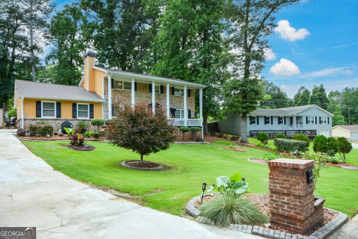 4 bedroom, 2.5 bathroom, 2,320 sq ft single family residence for sale at 7461 Page Court, Jonesboro, GA 30236 — photo 2