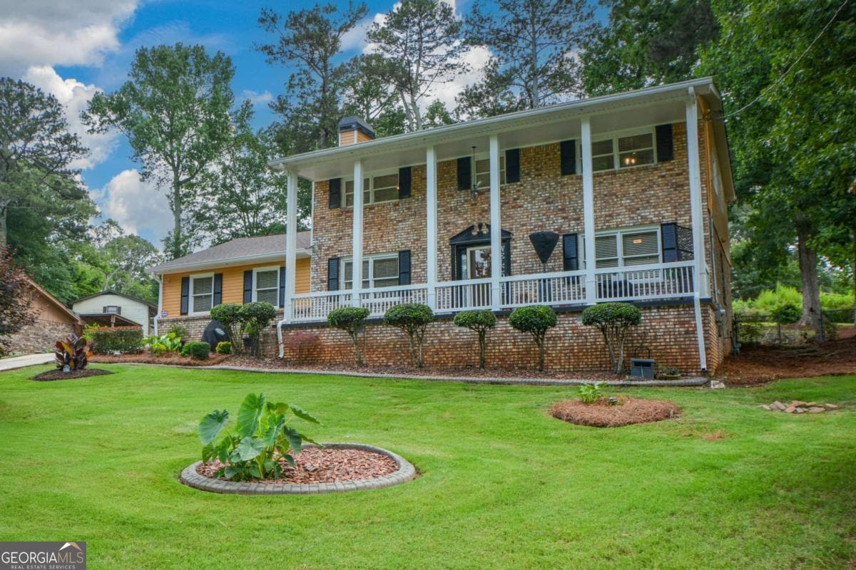 4 bedroom, 2.5 bathroom, 2,320 sq ft single family residence for sale at 7461 Page Court, Jonesboro, GA 30236 — photo 3