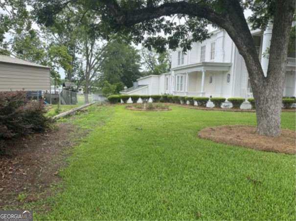 3 bedroom, 2 bathroom, 9,000 sq ft single family residence for sale at 107 Singleton Avenue, Sylvania, GA 30467 — photo 8