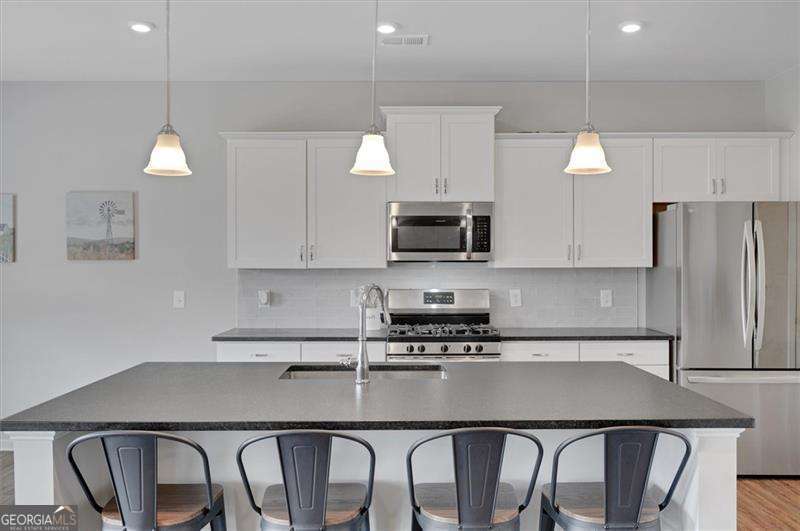 4 bedroom, 2.5 bathroom, 2,572 sq ft single family residence for sale at 34 Rock Foot Way, Cartersville, GA 30120 — photo 6