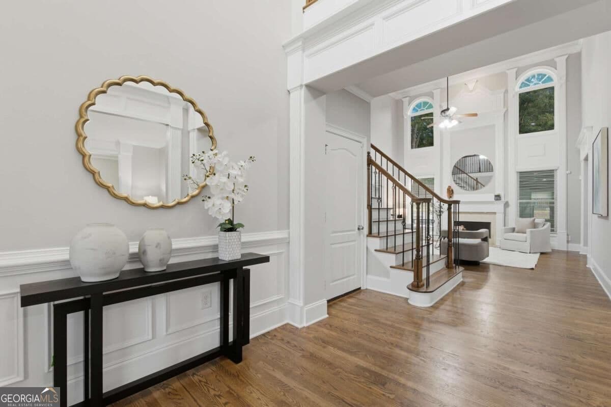 6 bedroom, 5 bathroom, 6,366 sq ft single family residence for sale at 1765 Severbrook Place, Lawrenceville, GA 30043 — photo 4
