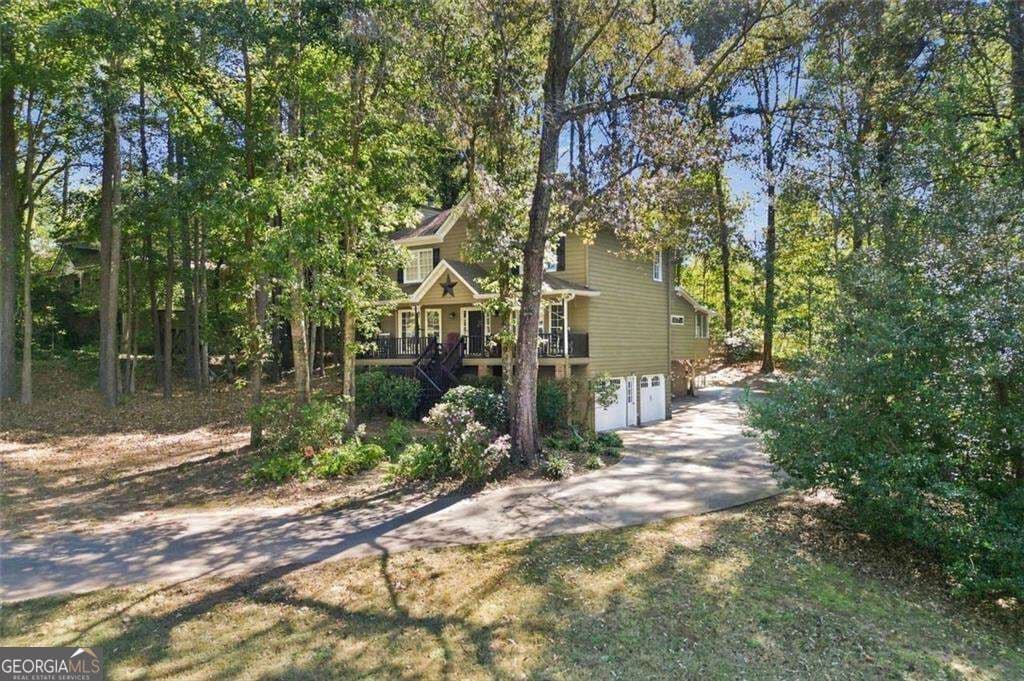 4 bedroom, 2.5 bathroom, 3,160 sq ft single family residence for sale at 2771 Still Lake Drive, Acworth, GA 30102 — photo 4