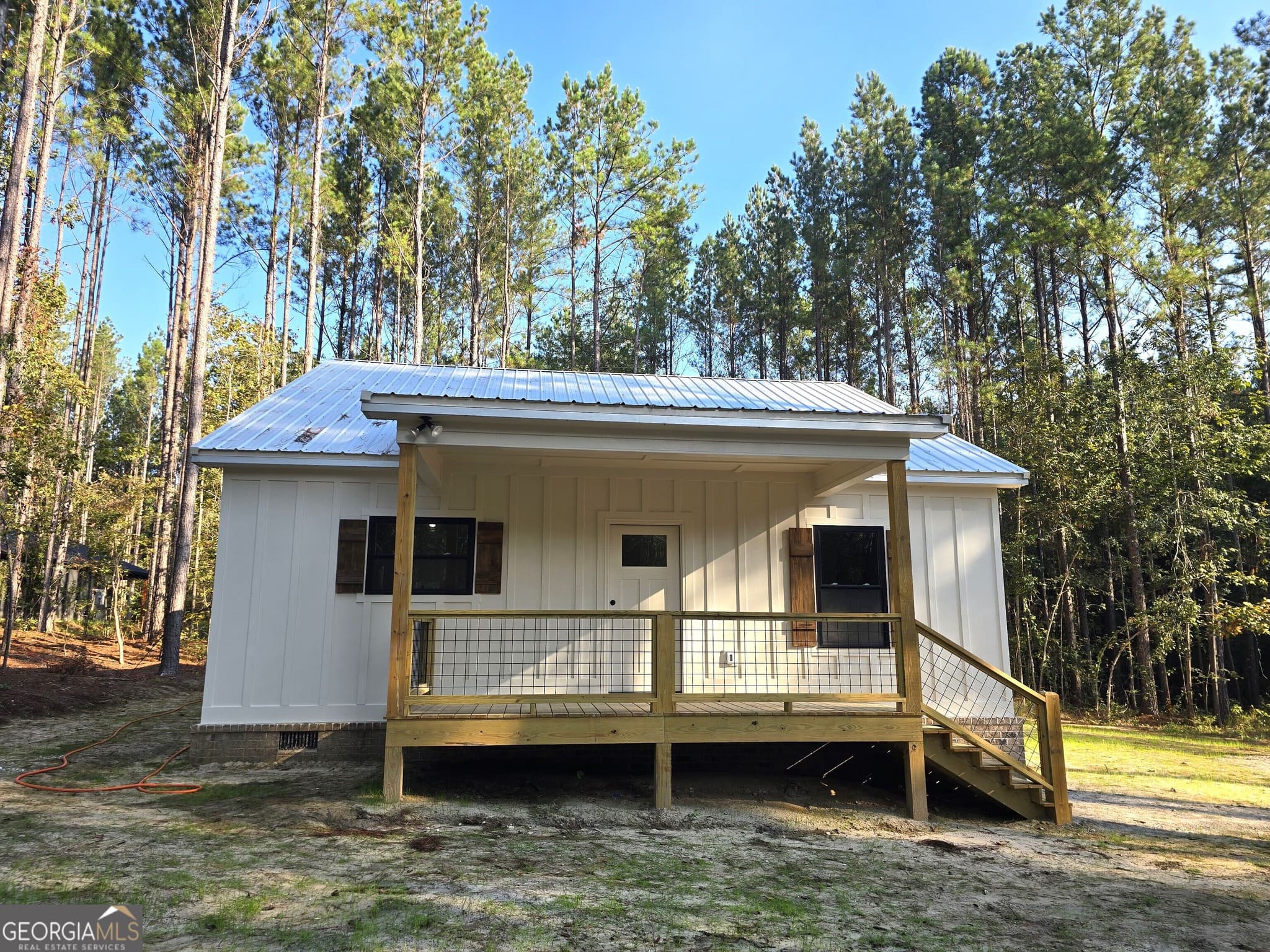 2 bedroom, 1 bathroom, 1,200 sq ft single family residence for sale at 1128 Clarks Bridge Road, Stapleton, GA 30823 — photo 1 of 11