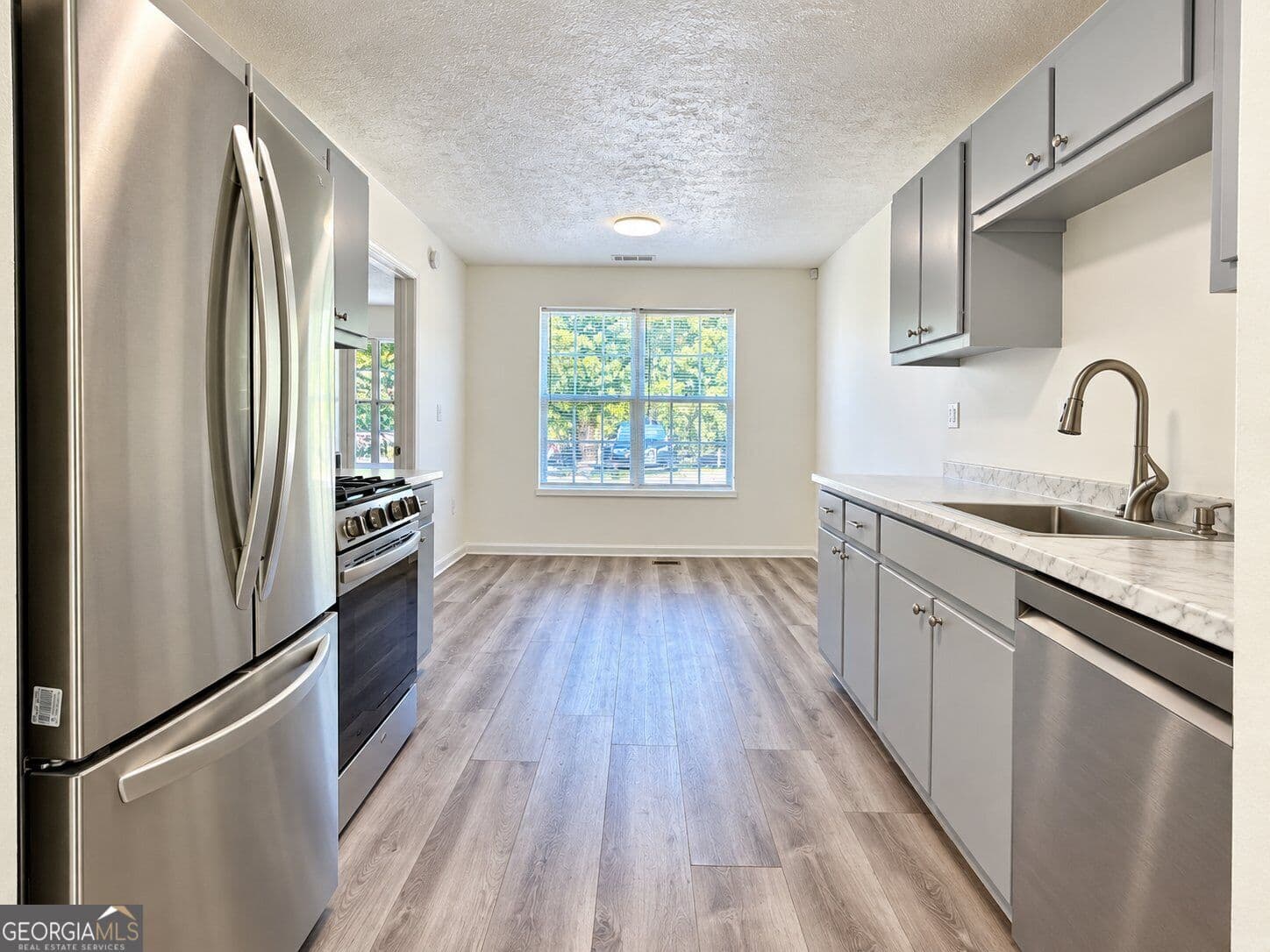 4 bedroom, 3 bathroom, 1,376 sq ft single family residence for sale at 200 Pine Ridge Drive, Carrollton, GA 30117 — photo 8