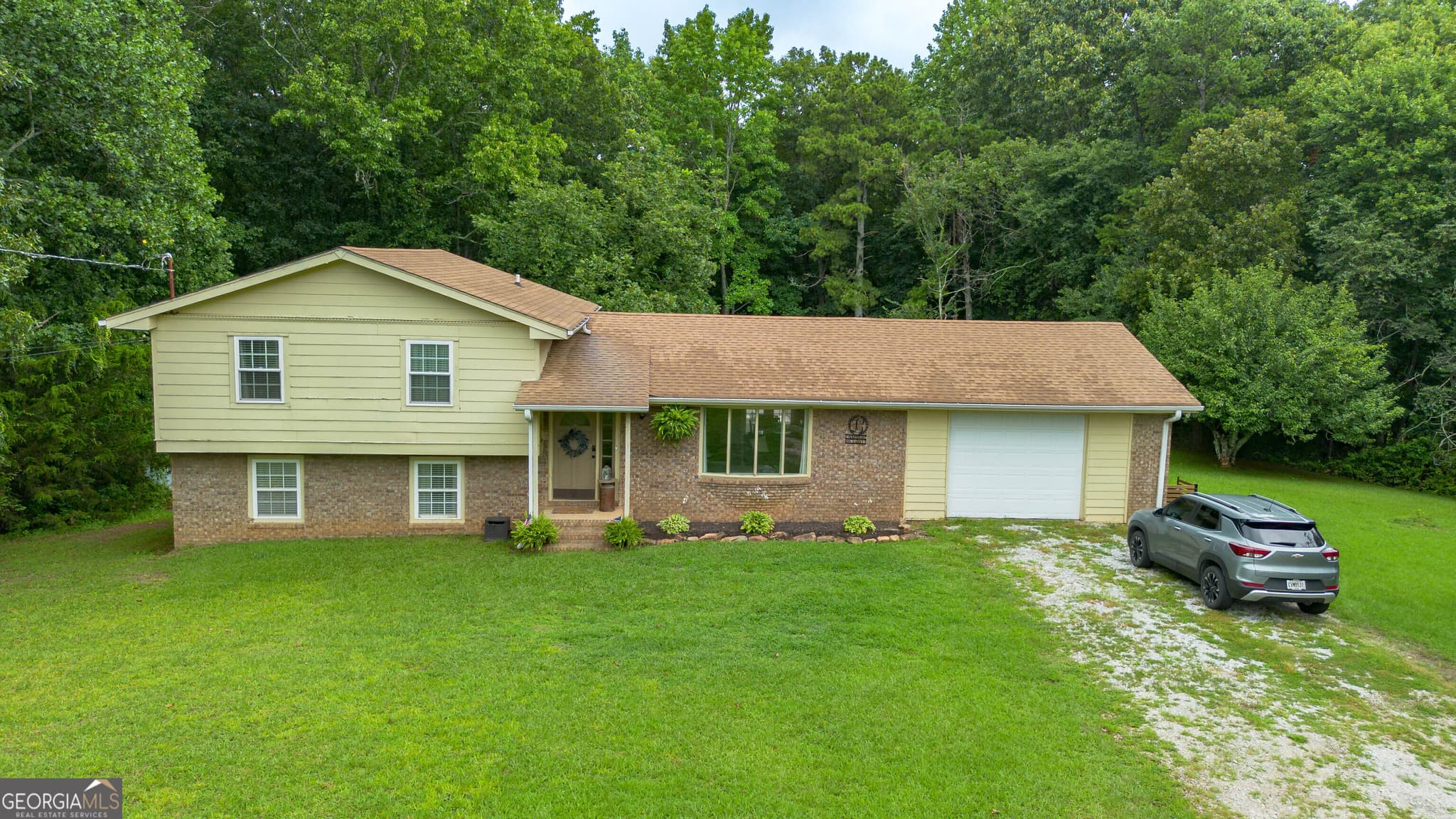 4 bedroom, 3 bathroom, 2,575 sq ft single family residence for sale at 60 Carlton Johnson Road, Waco, GA 30182 — photo 2
