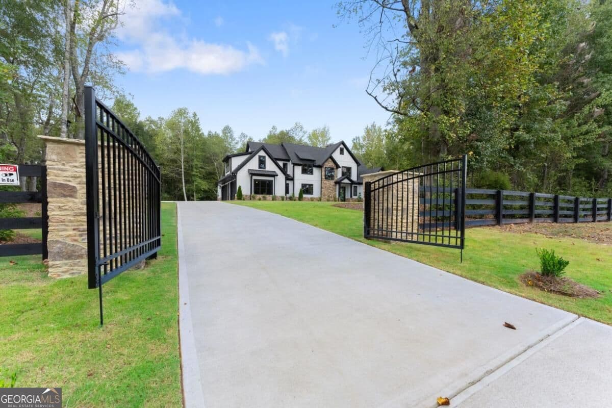 5 bedroom, 5.5 bathroom single family residence for sale at 5697 Ball Ground Road, Ball Ground, GA 30107 — photo 6