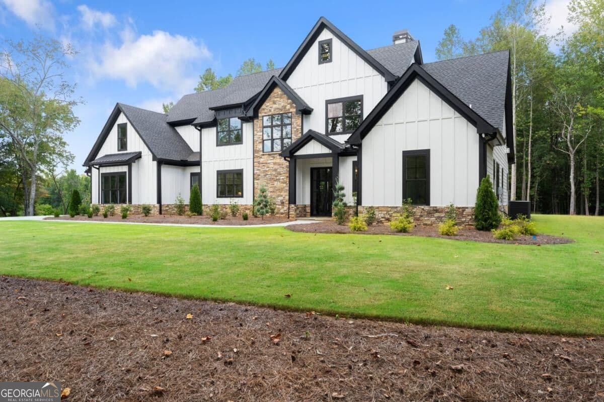 5 bedroom, 5.5 bathroom single family residence for sale at 5697 Ball Ground Road, Ball Ground, GA 30107 — photo 3