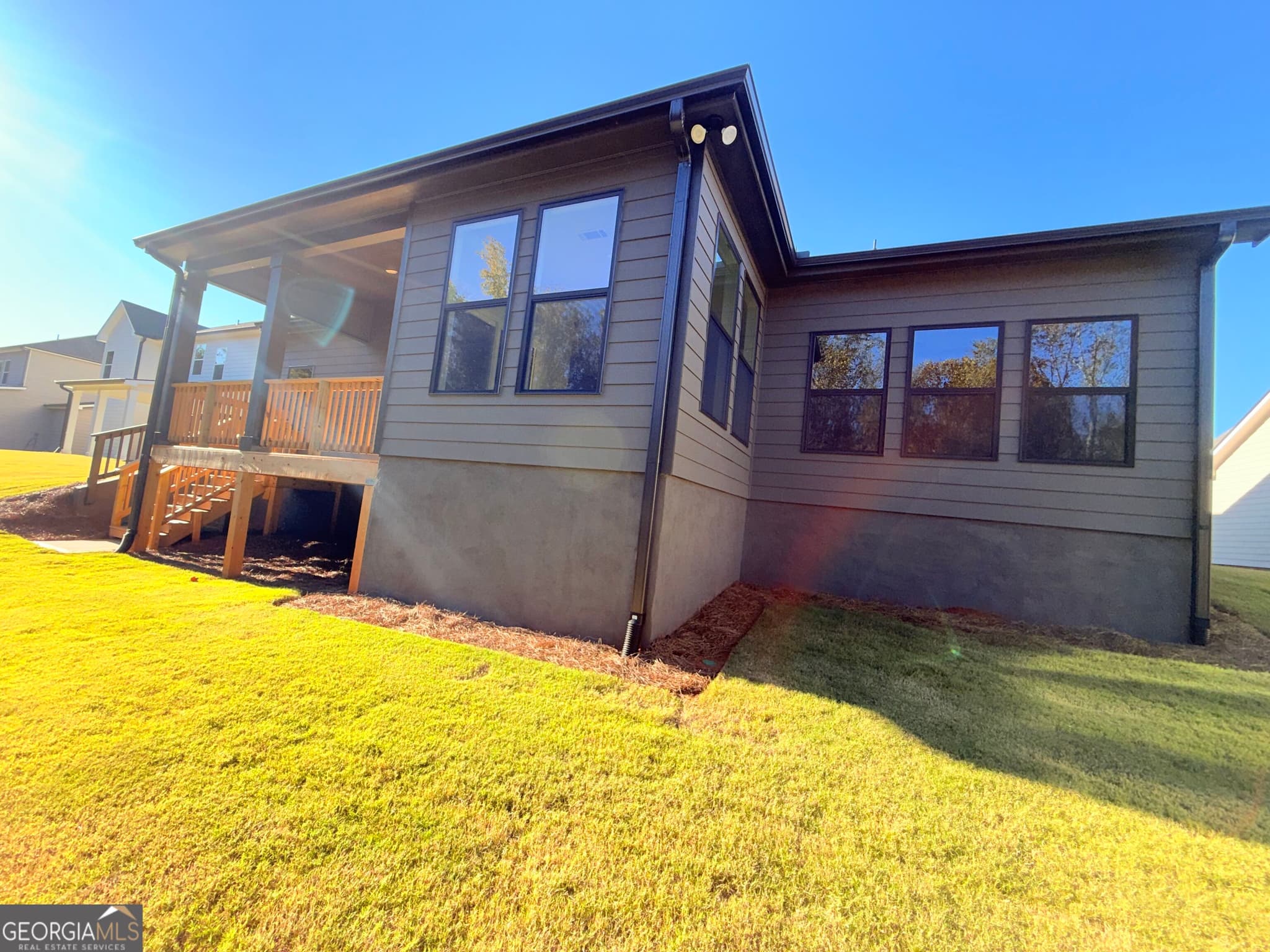 4 bedroom, 3.5 bathroom, 3,121 sq ft single family residence for sale at 5535 Tullis Drive, Gainesville, GA 30507 — photo 7