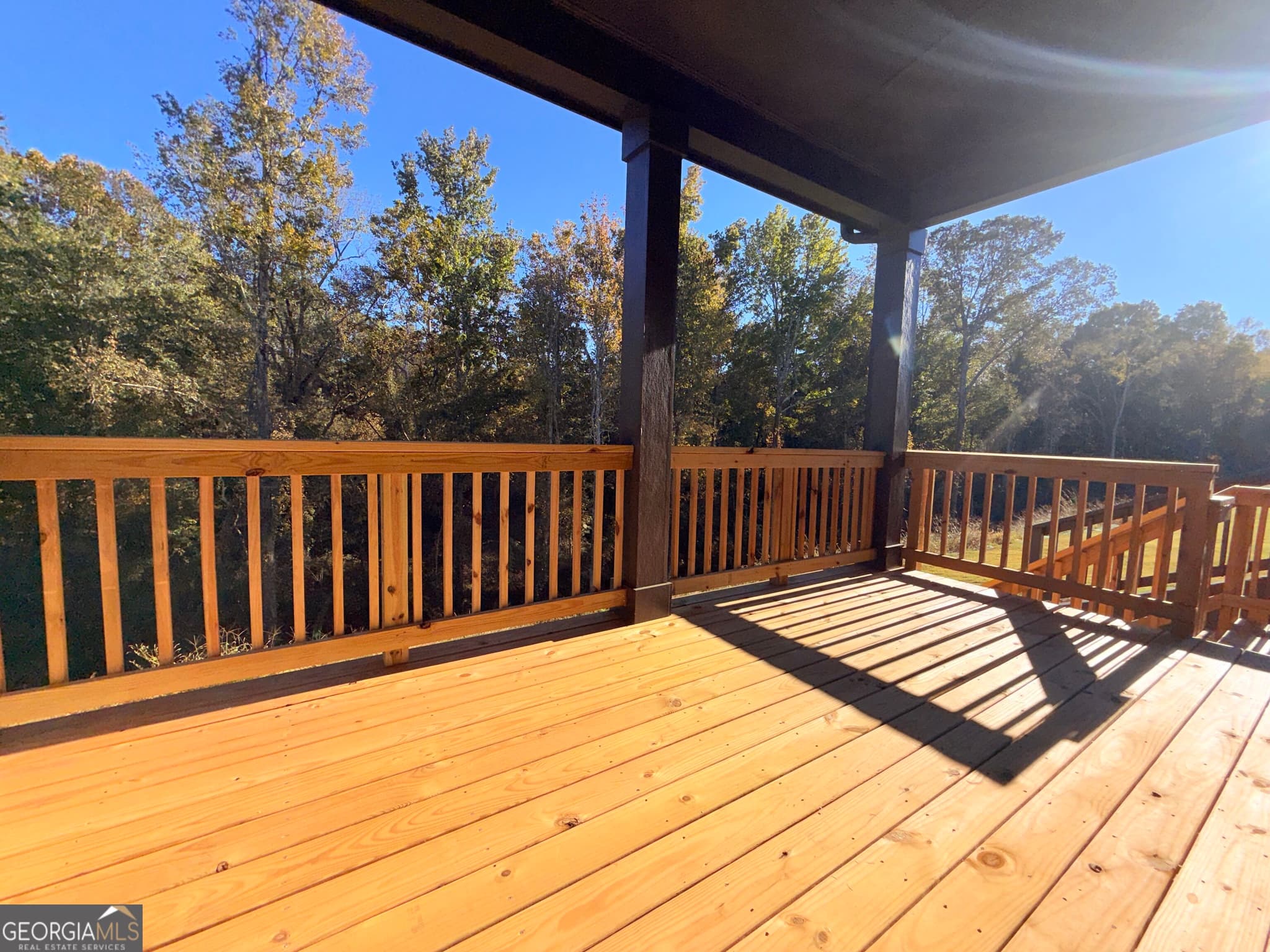 4 bedroom, 3.5 bathroom, 3,121 sq ft single family residence for sale at 5535 Tullis Drive, Gainesville, GA 30507 — photo 8