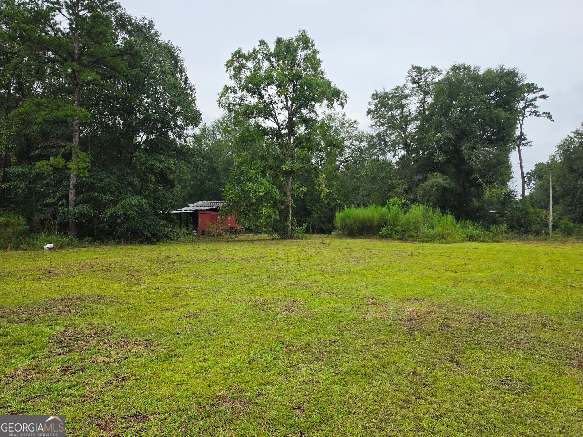 4 bedroom, 2 bathroom, 1,960 sq ft single family residence for sale at 3594 Bennetts Landing Road, Millen, GA 30442 — photo 3