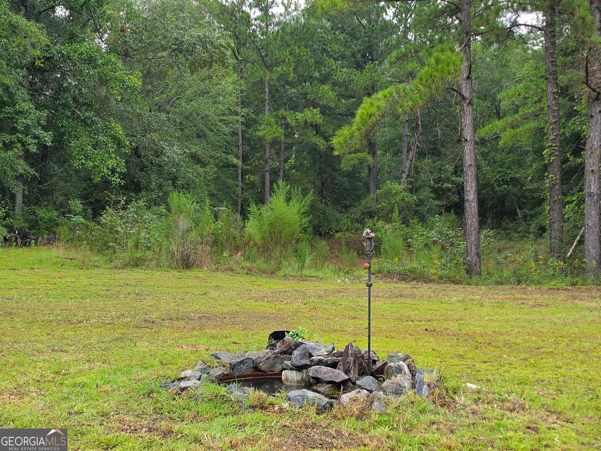 4 bedroom, 2 bathroom, 1,960 sq ft single family residence for sale at 3594 Bennetts Landing Road, Millen, GA 30442 — photo 4