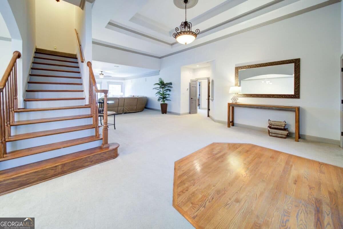 4 bedroom, 3.5 bathroom, 6,892 sq ft single family residence for sale at 6462 Waterscape Ridge, Gainesville, GA 30506 — photo 2