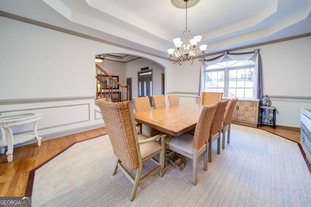 4 bedroom, 3.5 bathroom, 6,892 sq ft single family residence for sale at 6462 Waterscape Ridge, Gainesville, GA 30506 — photo 6