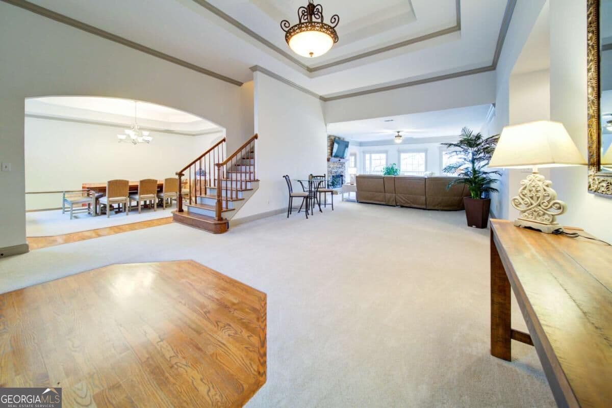 4 bedroom, 3.5 bathroom, 6,892 sq ft single family residence for sale at 6462 Waterscape Ridge, Gainesville, GA 30506 — photo 3