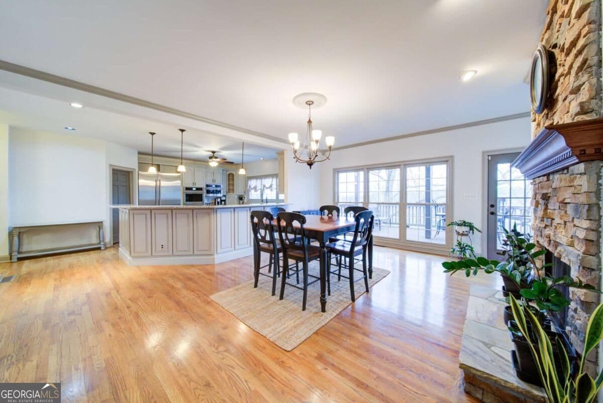4 bedroom, 3.5 bathroom, 6,892 sq ft single family residence for sale at 6462 Waterscape Ridge, Gainesville, GA 30506 — photo 8