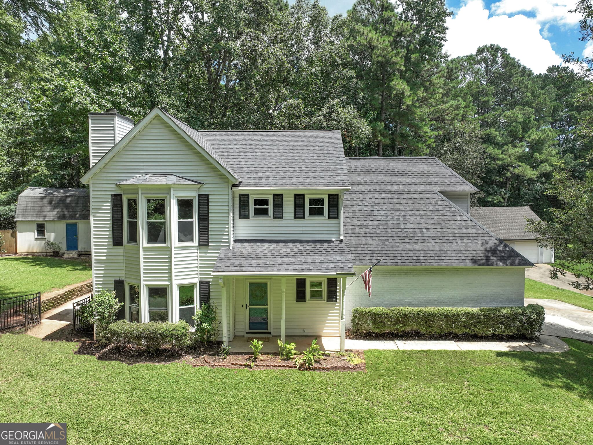 4 bedroom, 2.5 bathroom, 2,058 sq ft single family residence for sale at 1359 Fischer Road, Sharpsburg, GA 30277 — photo 2