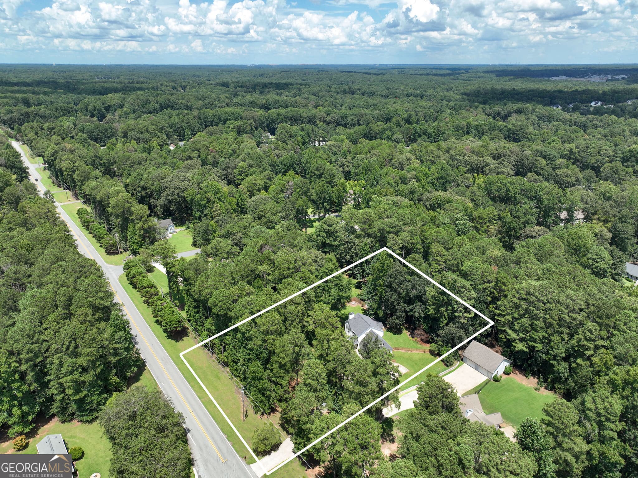 4 bedroom, 2.5 bathroom, 2,058 sq ft single family residence for sale at 1359 Fischer Road, Sharpsburg, GA 30277