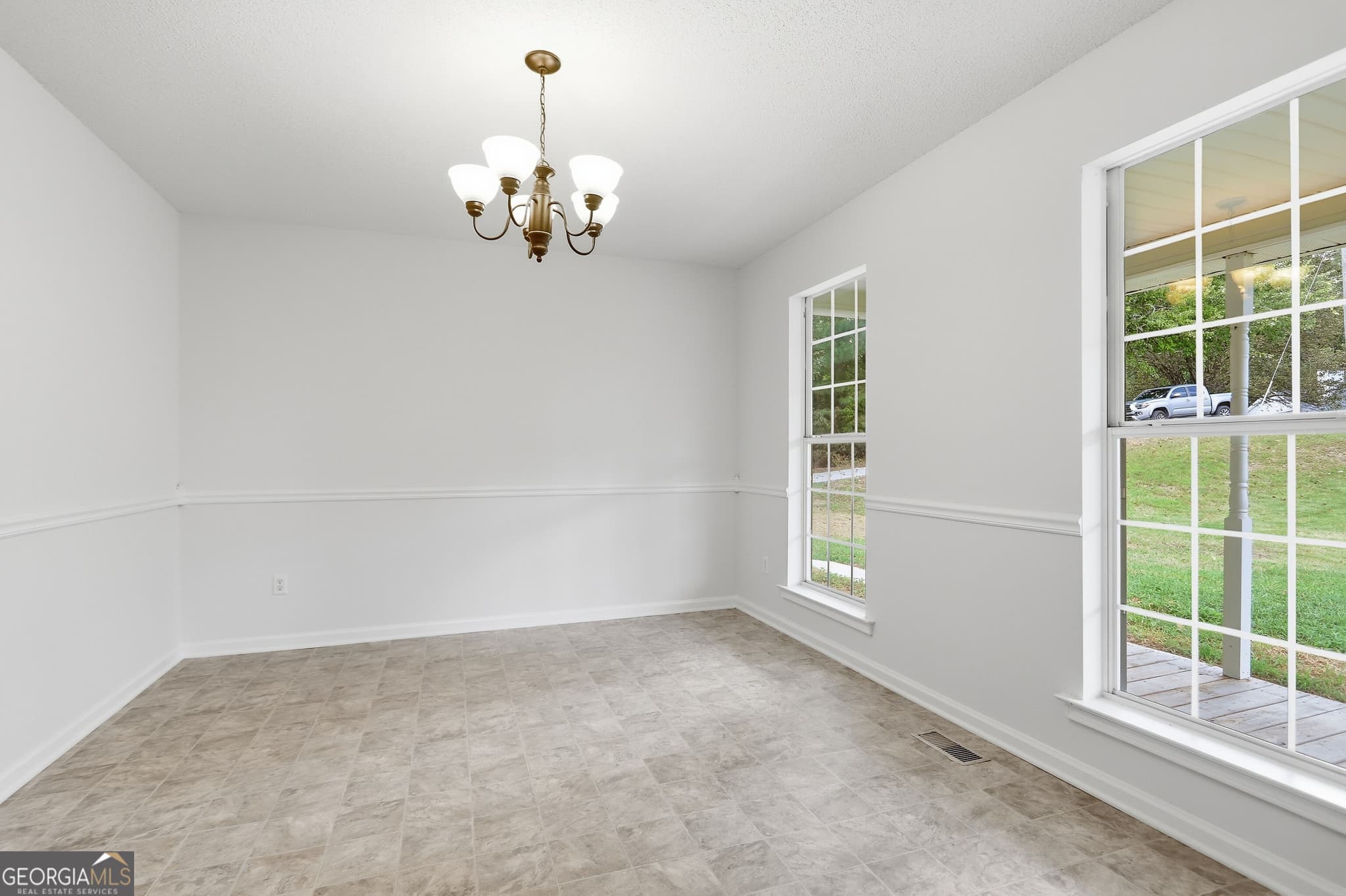 4 bedroom, 2.5 bathroom, 2,284 sq ft single family residence for sale at 1336 Fate Conn Road, Canton, GA 30114 — photo 4
