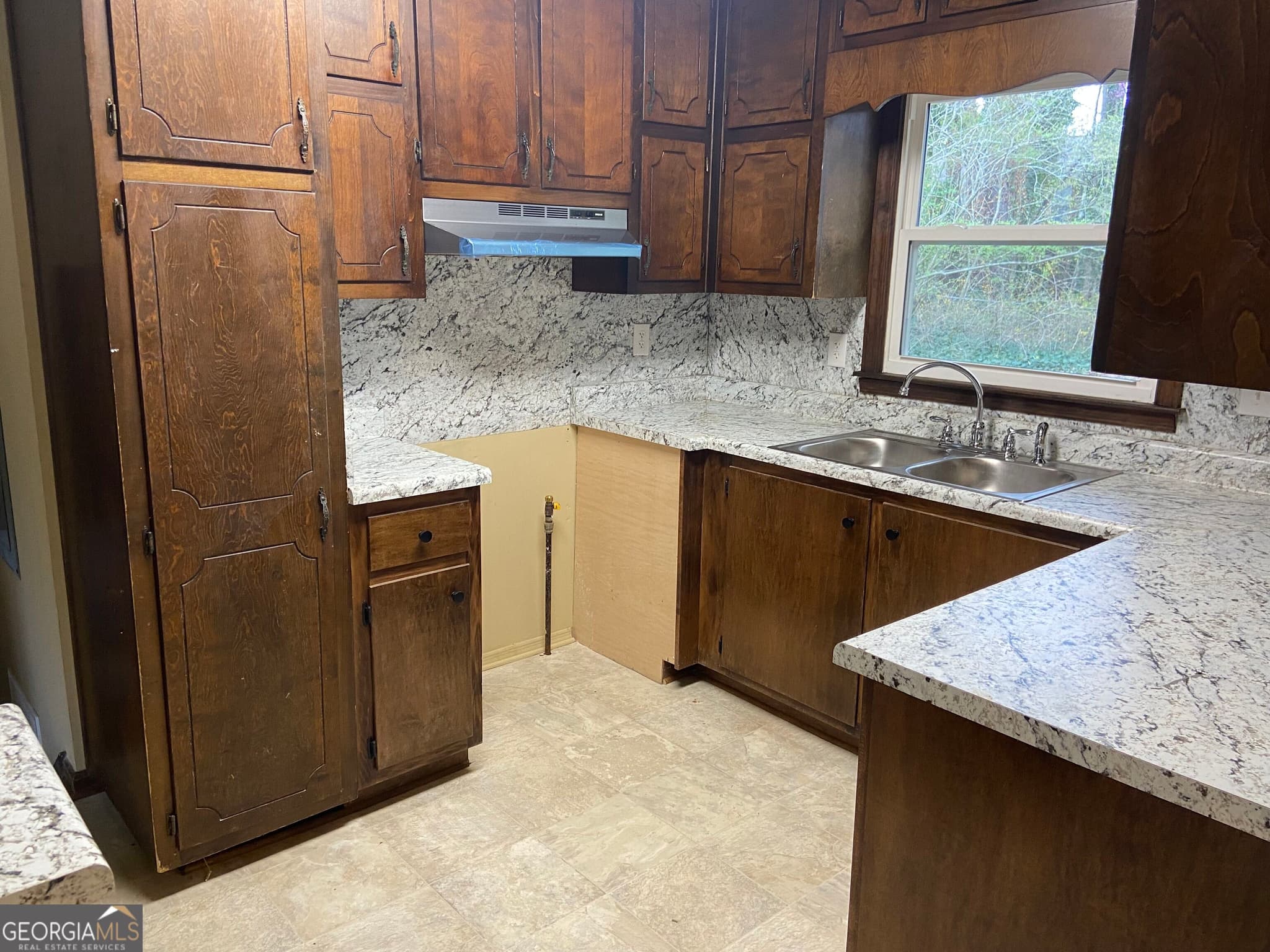 4 bedroom, 3 bathroom, 1,752 sq ft single family residence for sale at 1710 Hallmark Drive, Griffin, GA 30223 — photo 5