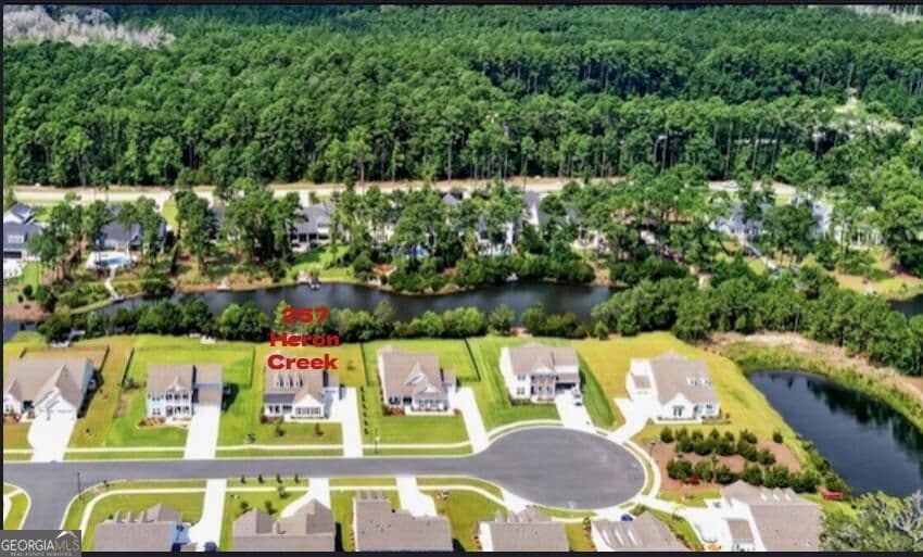 4 bedroom, 3 bathroom, 2,799 sq ft single family residence for sale at 257 Heron Creek Drive, Richmond Hill, GA 31324